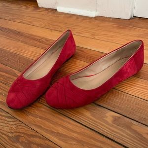 A pair of red flats